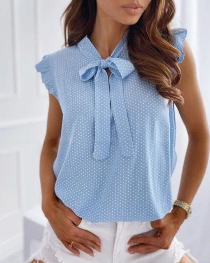 Blouse sans manches avec volants et détail de nœud