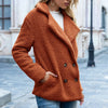 Manteau mi-long avec boutons double-breasted chic chaleur avec une silhouette intemporelle