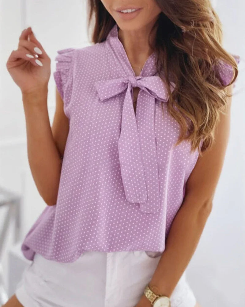 Blouse sans manches avec volants et détail de nœud
