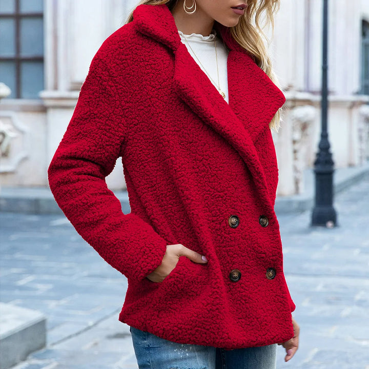 Manteau mi-long avec boutons double-breasted chic chaleur avec une silhouette intemporelle