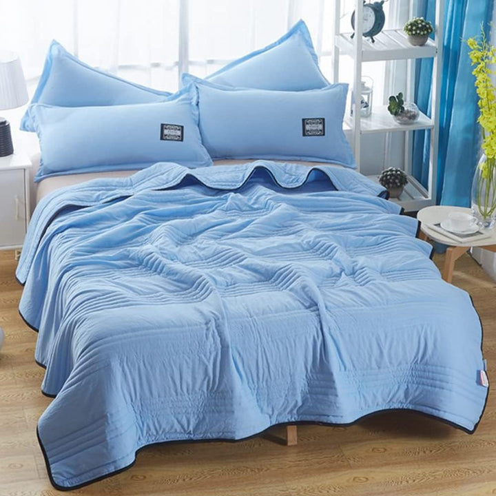 Couverture Rafraîchissante pour un Sommeil Sans Surchauffe