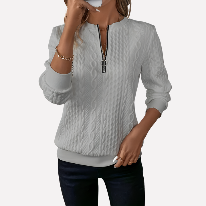 Pull-over en maille câblée pour femmes avec col zippé