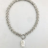 Collier de perles d'eau douce baroque avec chaîne en or et en argent