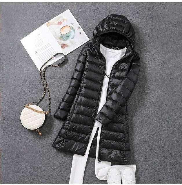 Manteau en Doudoune Long avec Capuche Détachable pour Femmes Restez Chauffées et Stylées Toute la Saison