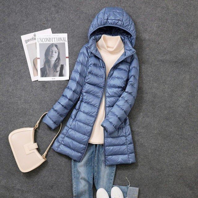 Manteau en Doudoune Long avec Capuche Détachable pour Femmes Restez Chauffées et Stylées Toute la Saison