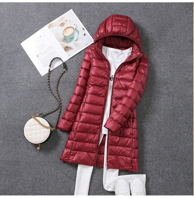 Manteau en Doudoune Long avec Capuche Détachable pour Femmes Restez Chauffées et Stylées Toute la Saison