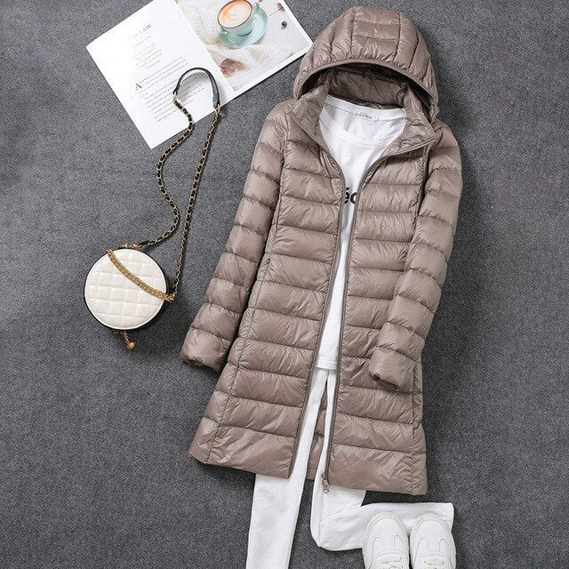 Manteau en Doudoune Long avec Capuche Détachable pour Femmes Restez Chauffées et Stylées Toute la Saison