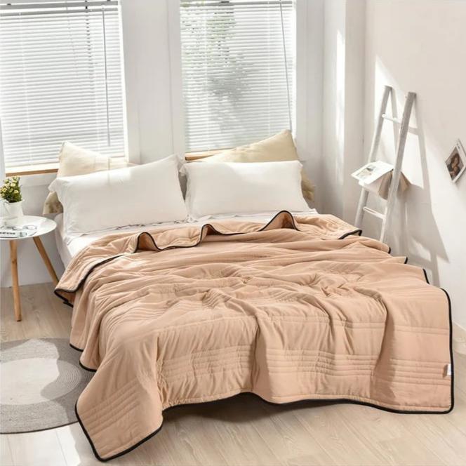Couverture Rafraîchissante pour un Sommeil Sans Surchauffe